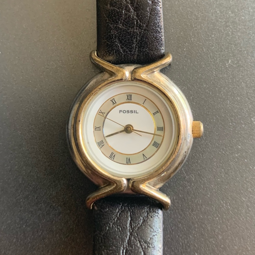 Vintage Women’s Fossil watch with mother of pearl inlay and decorative tin